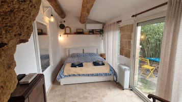 1 slaapkamer, een strijkplank/strijkijzer, wifi, beddengoed