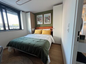 1 slaapkamer, een strijkplank/strijkijzer, wifi, beddengoed