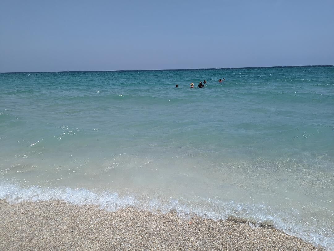 On the beach, sun loungers, beach towels