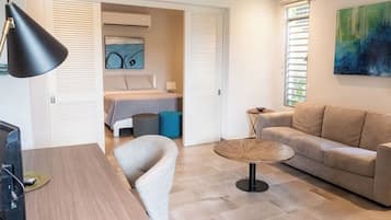 1 bedroom, desk, iron/ironing board, travel crib