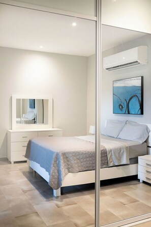 1 bedroom, desk, iron/ironing board, travel cot