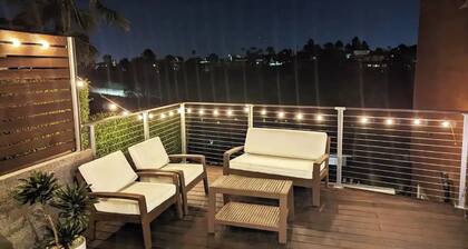 Modern Hillside Oasis with Jacuzzi, Ocean Views, BBQ, EV Charger, Treetop Master