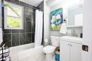 Regadera y secadora de cabello 