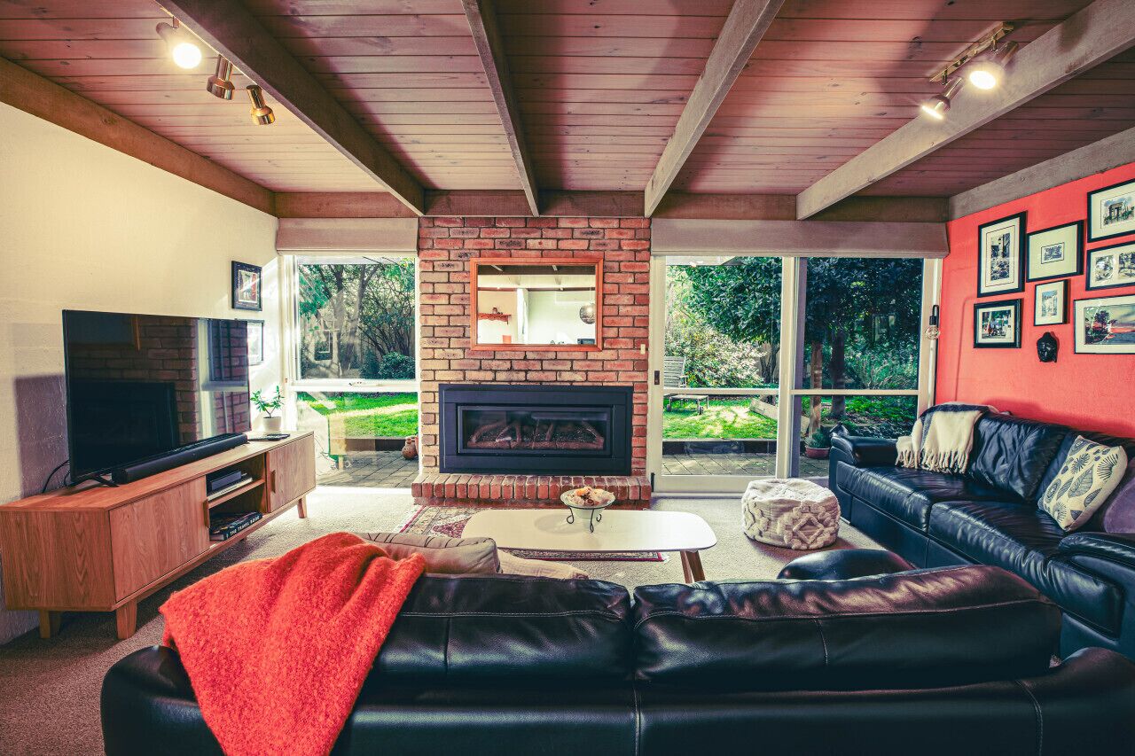 Smart TV, fireplace, books