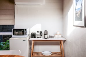 Fridge, microwave, dishwasher, coffee/tea maker