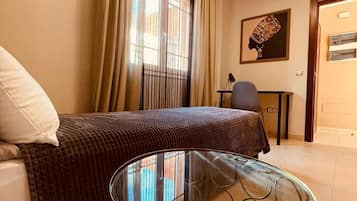 4 dormitorios, tabla de planchar con plancha, wifi y ropa de cama