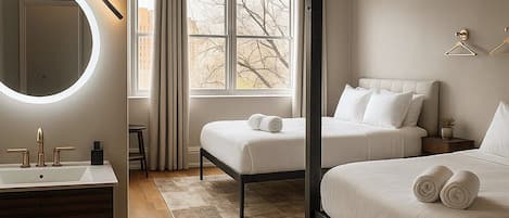 Deluxe Quadruple Room, 2 Queen Beds, Mountain View | Premium bedding, down comforters, individually decorated