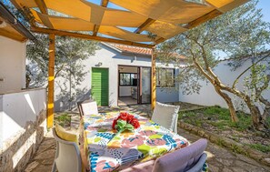 Outdoor dining - 2 bedroom nice home in Jezera (Jezera)