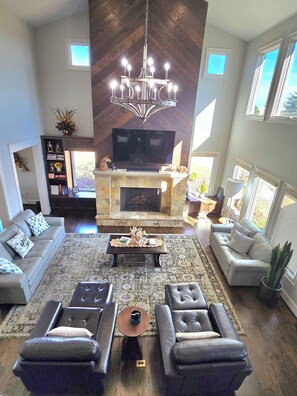 Smart TV, fireplace, table football, books