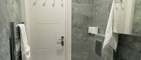 Hair dryer, towels, soap, toilet paper