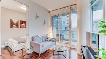 Departamento exclusivo, vista a la ciudad | Área de sala de estar