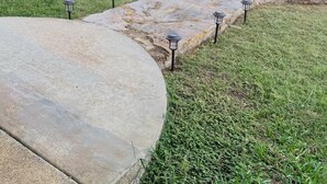 A concrete pathway with stone steps and black lantern-style lights. - Stillhouse Lake Fishing Retreat -Cedar Creek Ranch, 10 Acres + Boat Parking (Salado)