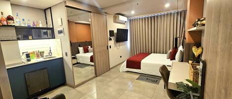 Habitación Deluxe, vistas a la ciudad | Sábanas de algodón egipcio y ropa de cama de alta calidad