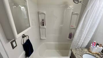 Hair dryer, towels, soap, toilet paper
