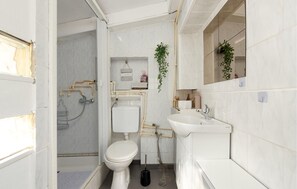 Regadera y secadora de cabello 