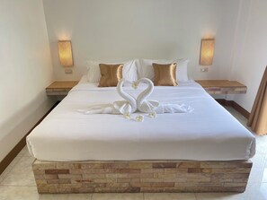 Studio, Balcony, Pool View | In-room safe, desk, laptop workspace, blackout drapes