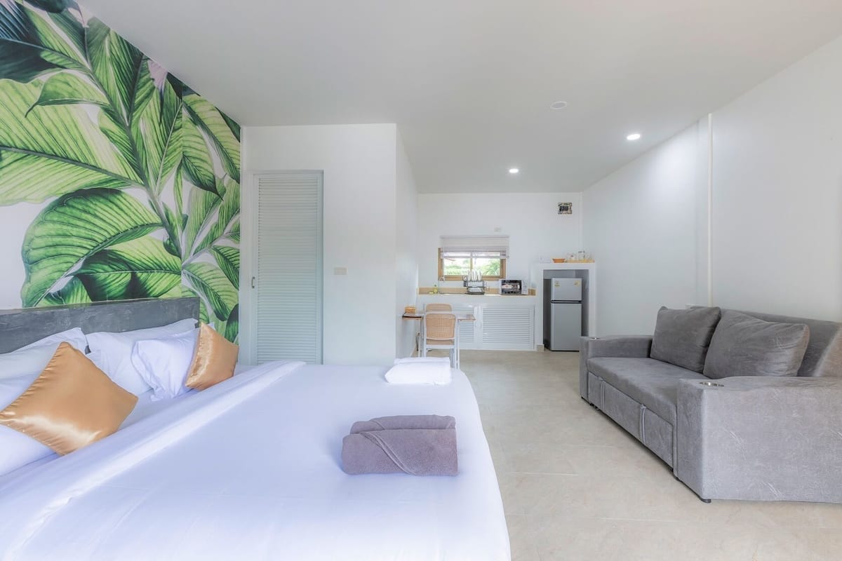 Triple Room, Balcony, Hill View | In-room safe, desk, laptop workspace, blackout drapes