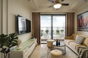 Luxury Apartment | Living area | 45-inch flat-screen TV with digital channels - SOL - Vinhomes D'capital (Hanoi)