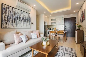 Basic Apartment | Living area | 45-inch flat-screen TV with digital channels - SOL - Vinhomes D'capital (Hanoi)