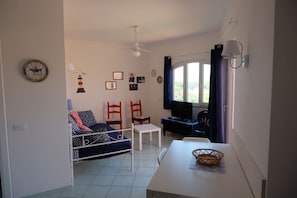 Basic Apartment, Kitchen, Partial Sea View | Living area
