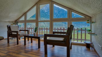 Premium Double Room, Balcony, Mountain View | Living area | LCD TV