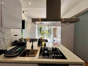 Microwave, stovetop, coffee/tea maker, toaster