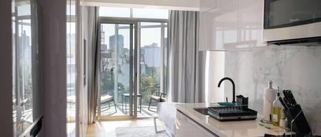 Microwave, stovetop, coffee/tea maker, toaster