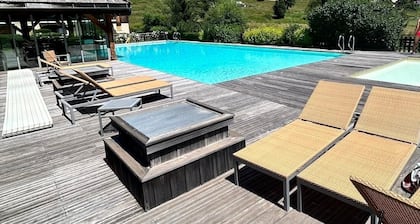Appart 2 ch au pied des pistes avec Piscine chauffée