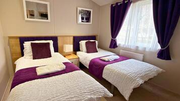 3 عدّة غرف نوم ومكواة/لوح كي وواي فاي مجانًا وملاءات أسرّة