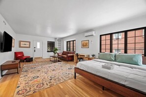 1 bedroom, desk, iron/ironing board, travel crib