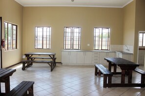 Apartamento, 3 quartos, varanda, vista para o jardim | Opções para refeição