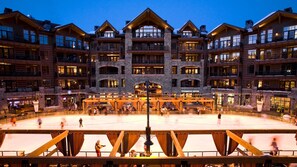 Stunning hotel with a central atrium and large windows, offering panoramic views.