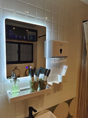 Shower, towels, soap, toilet paper