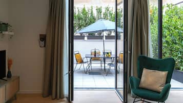 Design maisonnette, uitzicht op tuin | Uitzicht vanuit de kamer