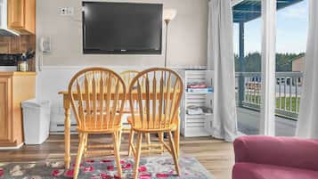Classic Condo | Living area | 32-inch flat-screen TV with cable channels