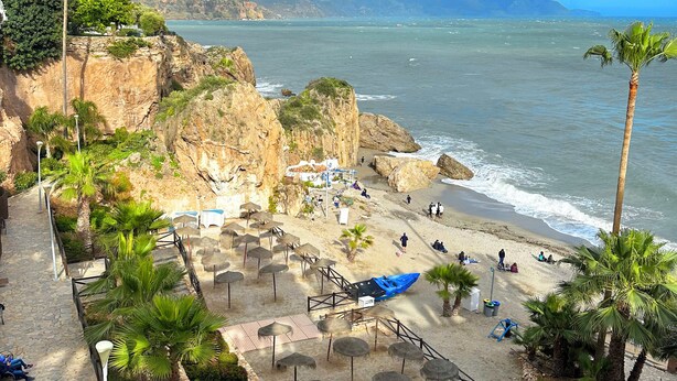 A coastal resort with a rocky cliff, beach, and palm trees. - Andalusian finca with private pool, sea views and stunning sunsets (Torrox)