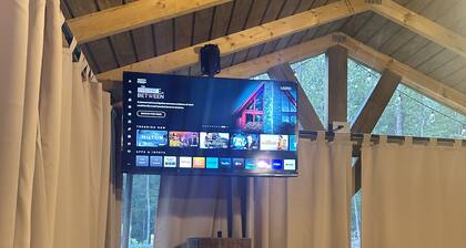 Mentone glamping getaway in a private screened in cabin in charming Mentone