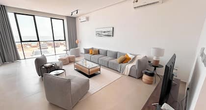 Spacious 3-bedroom apartment in charming As Sifah with WiFi, AC