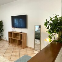 Paris Suite | Living area | 55-inch Smart TV with digital channels