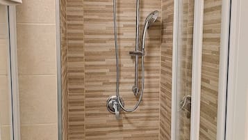 Rome Suite | Bathroom | Free toiletries, hair dryer, slippers, soap