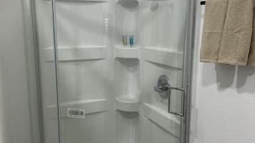 Shower, towels, toilet paper