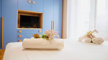 2 chambres, coffres-forts dans les chambres, fer et planche Ă repasser