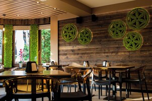 Breakfast, lunch, dinner served; garden views