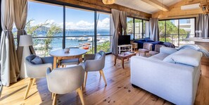 Comfort Villa, Sea View | Living area | Flat-screen TV