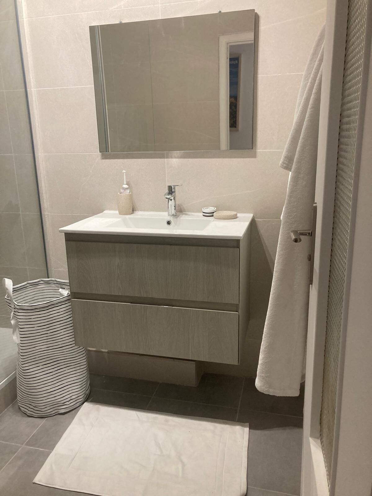 Shower, towels, soap, toilet paper