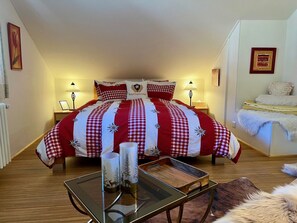 4 bedrooms, desk, iron/ironing board, travel cot