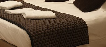 Comfortable rooms in a 16th-century building in the town center. 