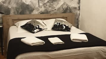5 habitaciones, tabla de planchar con plancha, wifi y ropa de cama