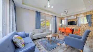 Villa Familiale, piscine privée, vue jardin | Coin séjour