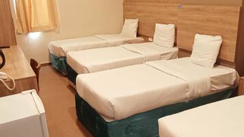 Basic Quadruple Room | Hypo-allergenic bedding, pillow-top beds, in-room safe